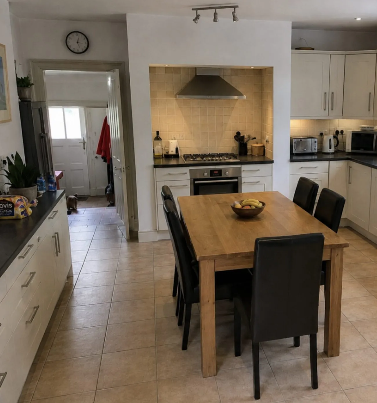 Kitchen before, tired cream units